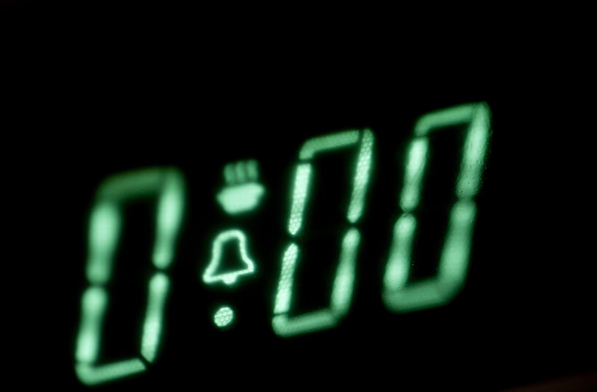 Glowing green digital clock display